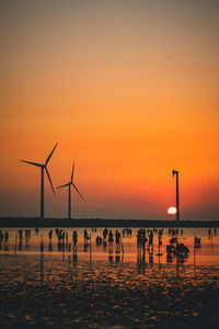 Scenic view of beach against sky during sunset