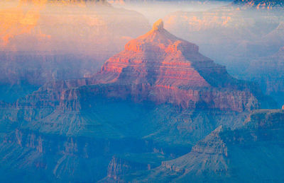 Digital composite image of mountain and lake