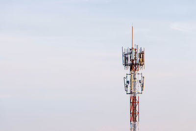 Communications tower against sky