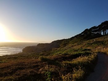 Scenic view of sea against clear sky