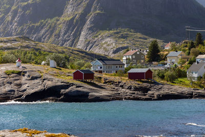 Scenic view of sea against mountain