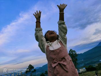 Low angle view of statue against sky