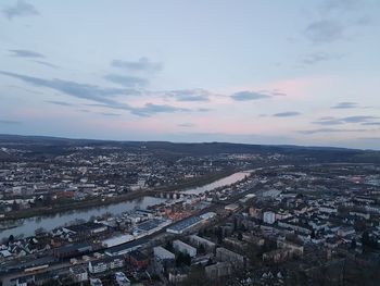 High angle view of buildings against sky during sunset