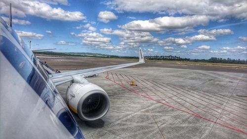 Low angle view of airplane on landscape