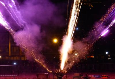 Firework display at night