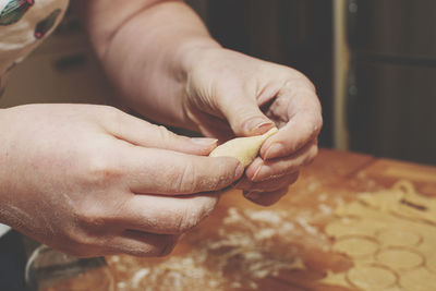 Close-up of hand holding ice cream