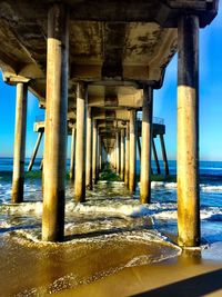 Pier on sea against sky