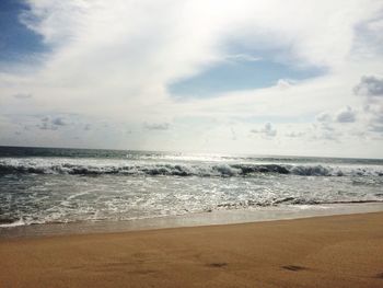 View of sea against cloudy sky