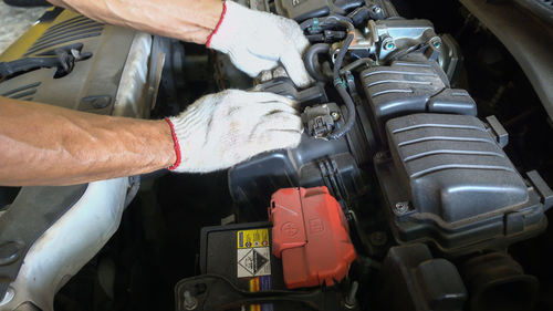 Man working in car