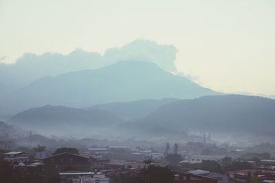 High angle view of cityscape against mountains