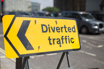 Information sign on road in city