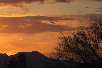 Scenic view of mountains at sunset