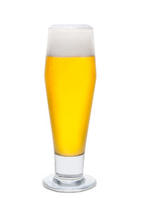 Close-up of beer glass against white background