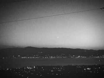 Scenic view of landscape against sky at night