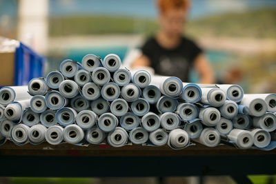 Stacked fabrics arranged on table in industry