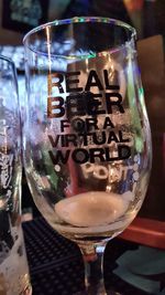 Close-up of beer glass on table