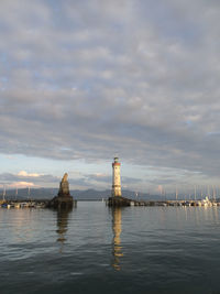 Scenic view of sea against sky in city