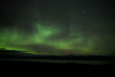 Scenic view of green aurora borealis