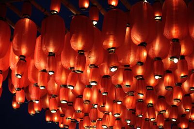 Low angle view of illuminated lanterns hanging