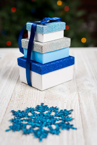 Close-up of christmas presents on table