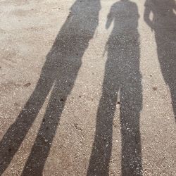 Shadow of people on wall