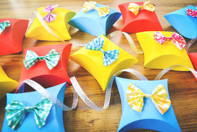 High angle view of multi colored umbrellas on table