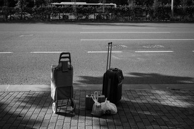 Garbage bin on street in city