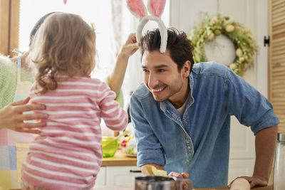 Rear view of father with daughter