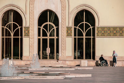 People standing outside building