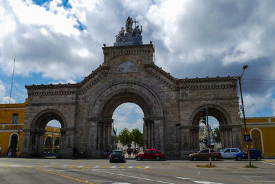 View of historical building against cloudy sky