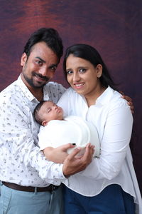 High angle view of mother and daughter at home
