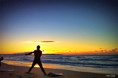 Scenic view of sea at sunset