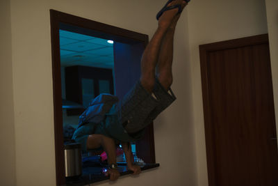 Low section of man at home