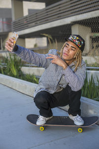 Young man skateboarding.