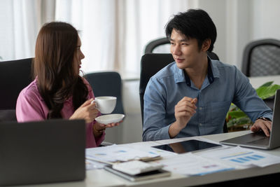 Business colleagues working at office