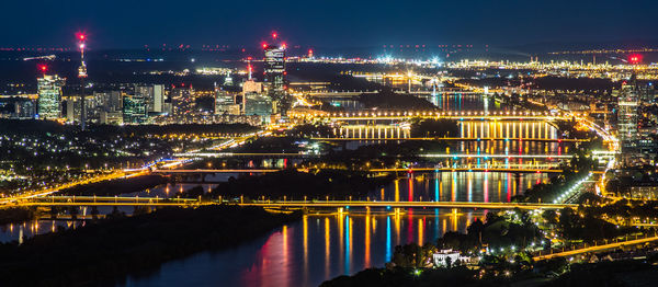 Illuminated buildings in city at night