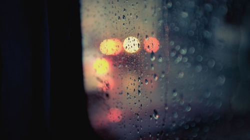 Close-up of water drops on glass window