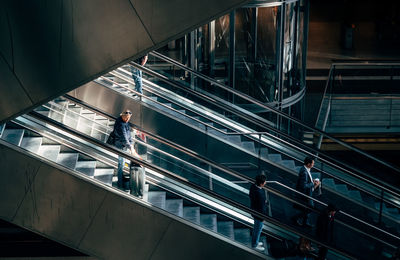 High angle view of people on escalator