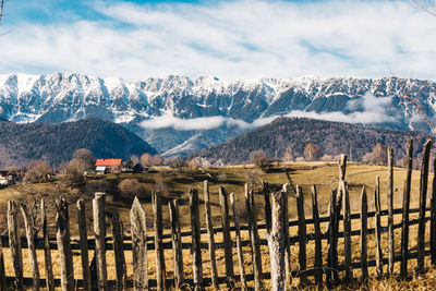 Scenic view of snowcapped mountains against sky