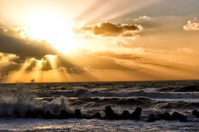 Scenic view of sea against sky during sunset