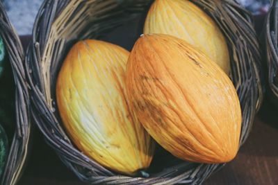 Close-up of fruits in basket on table