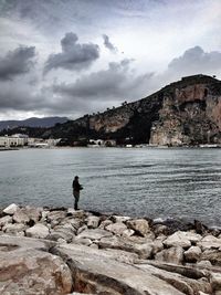 Scenic view of sea against cloudy sky