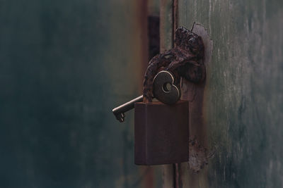 Close-up of padlock on door