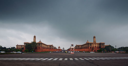 Buildings in city against sky