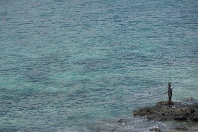 Man standing in sea