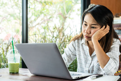 Businesswoman working at office