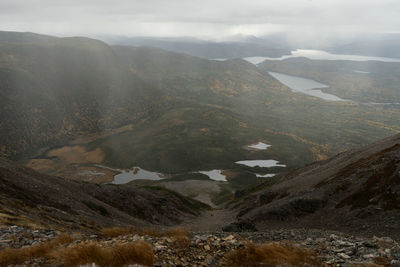 Aerial view of mountains against sky