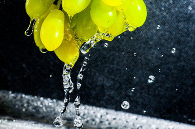 High angle view of drops falling in water