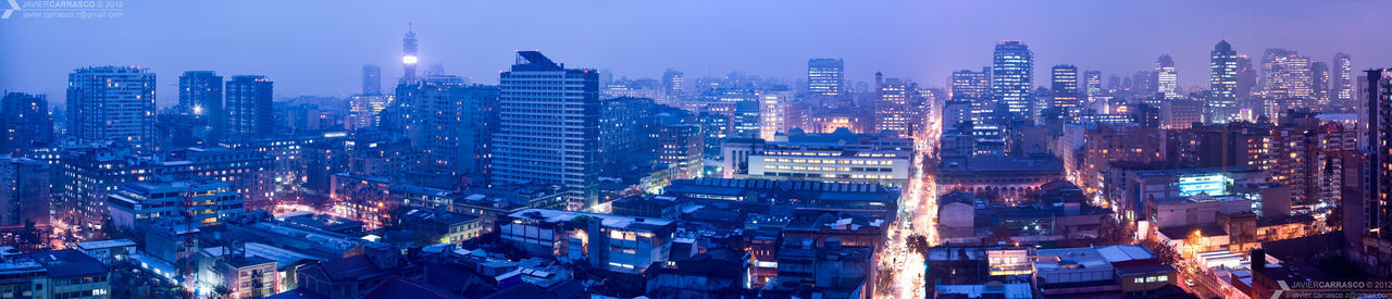 AERIAL VIEW OF ILLUMINATED CITY