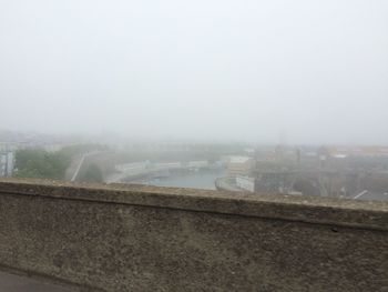 View of cityscape during foggy weather